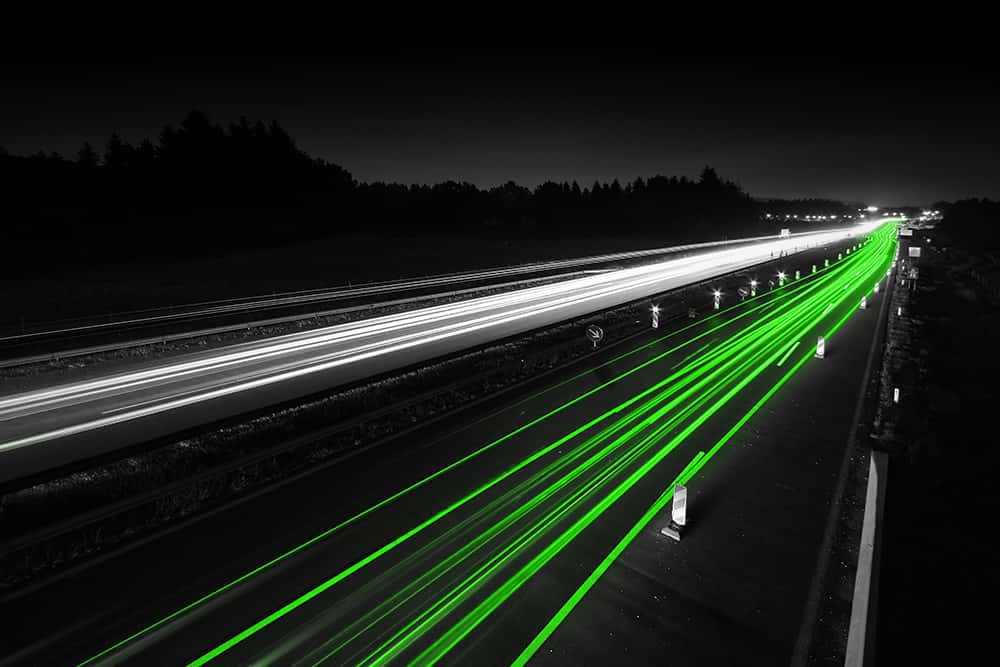 Streaks of white and green lights